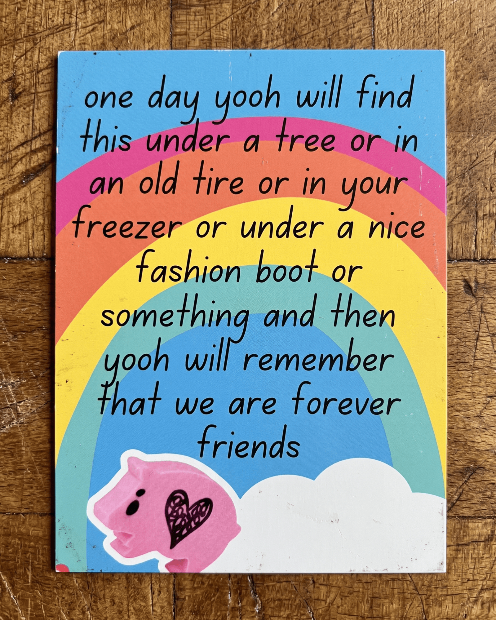 forever friends rainbow card photographed on wood